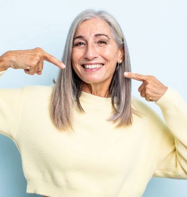 Smiling, mature woman with beautiful teeth