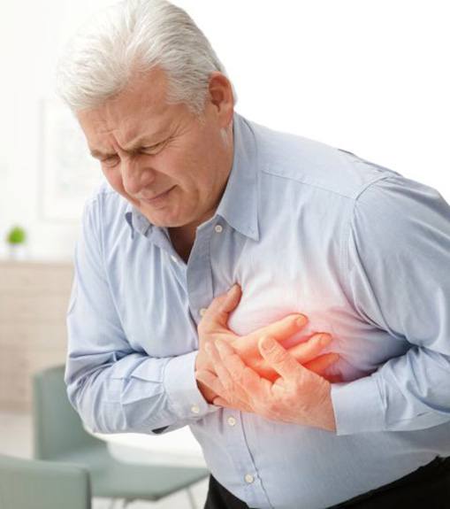 Senior man suffering from heart problem