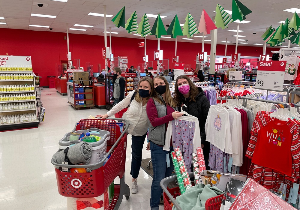 Dental team members shopping at Target for clothes to donate