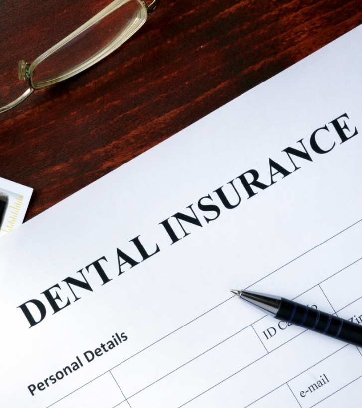 Dental insurance paperwork on desk