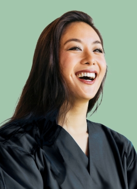 Woman in black blouse laughing