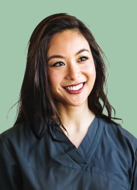 Woman in black blouse smiling