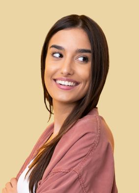 Brunette woman looking over her shoulder