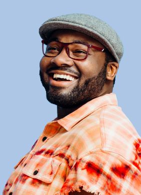 Man in golf cap smiling