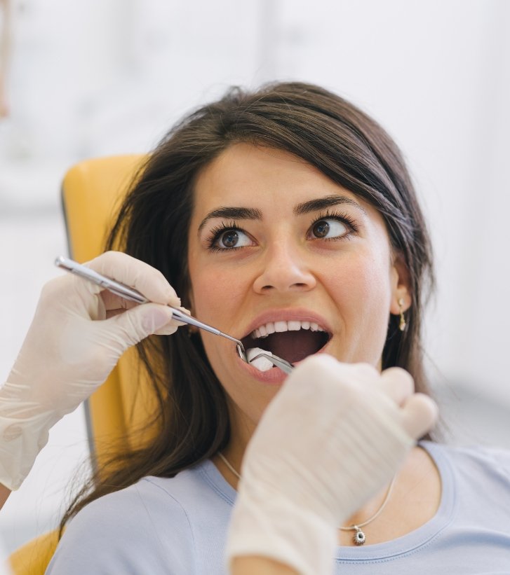 Woman receiving a dental checkup