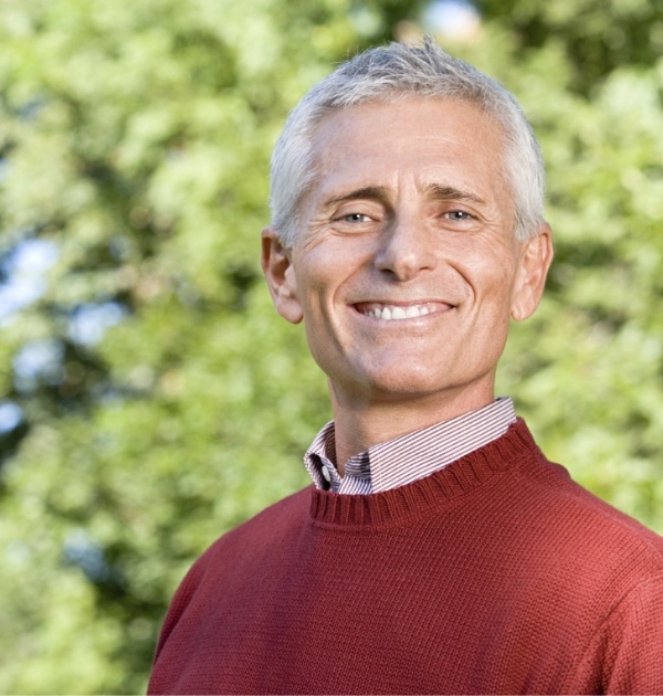 Man smiling after using recommended dental products in Beaverton