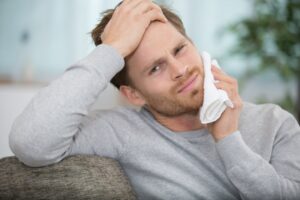 Man with one-sided jaw pain